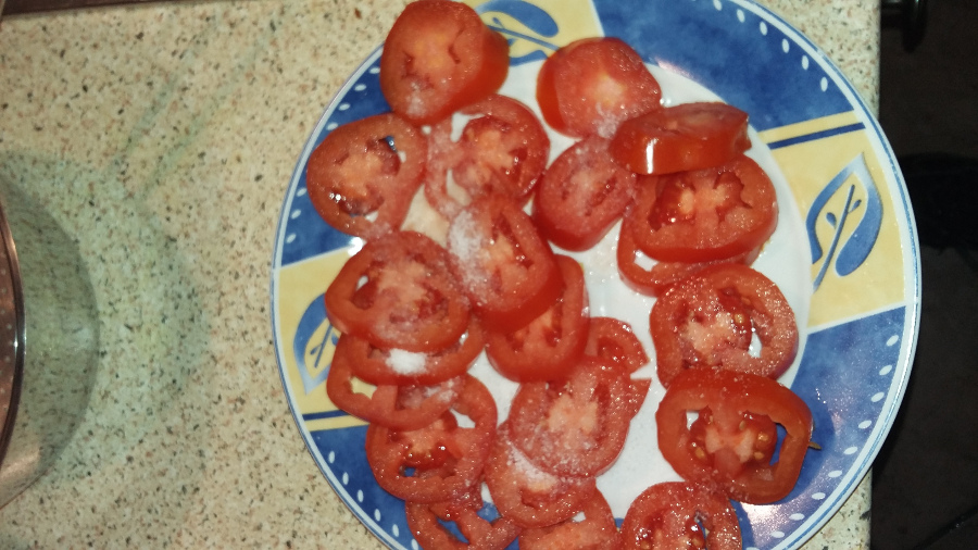 sliced salted tomatoes